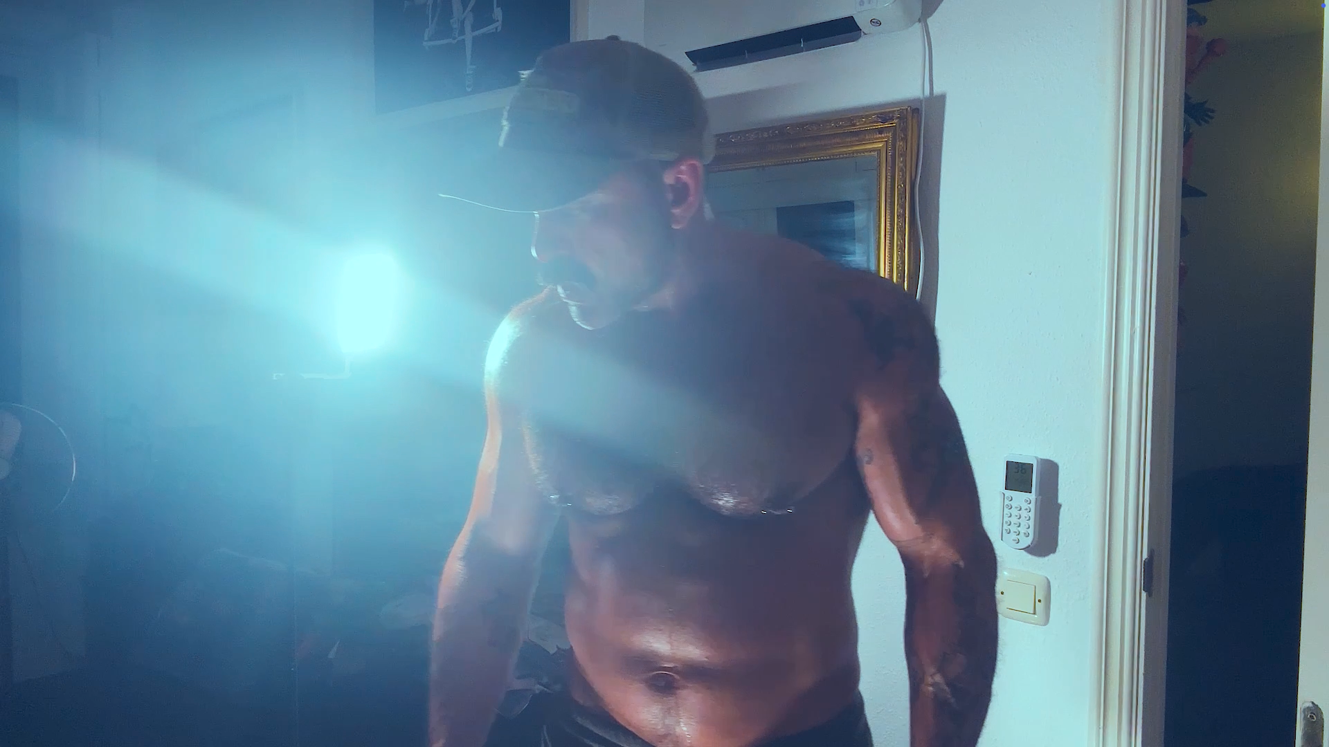 Pumping my GUNS up at home with my bands.